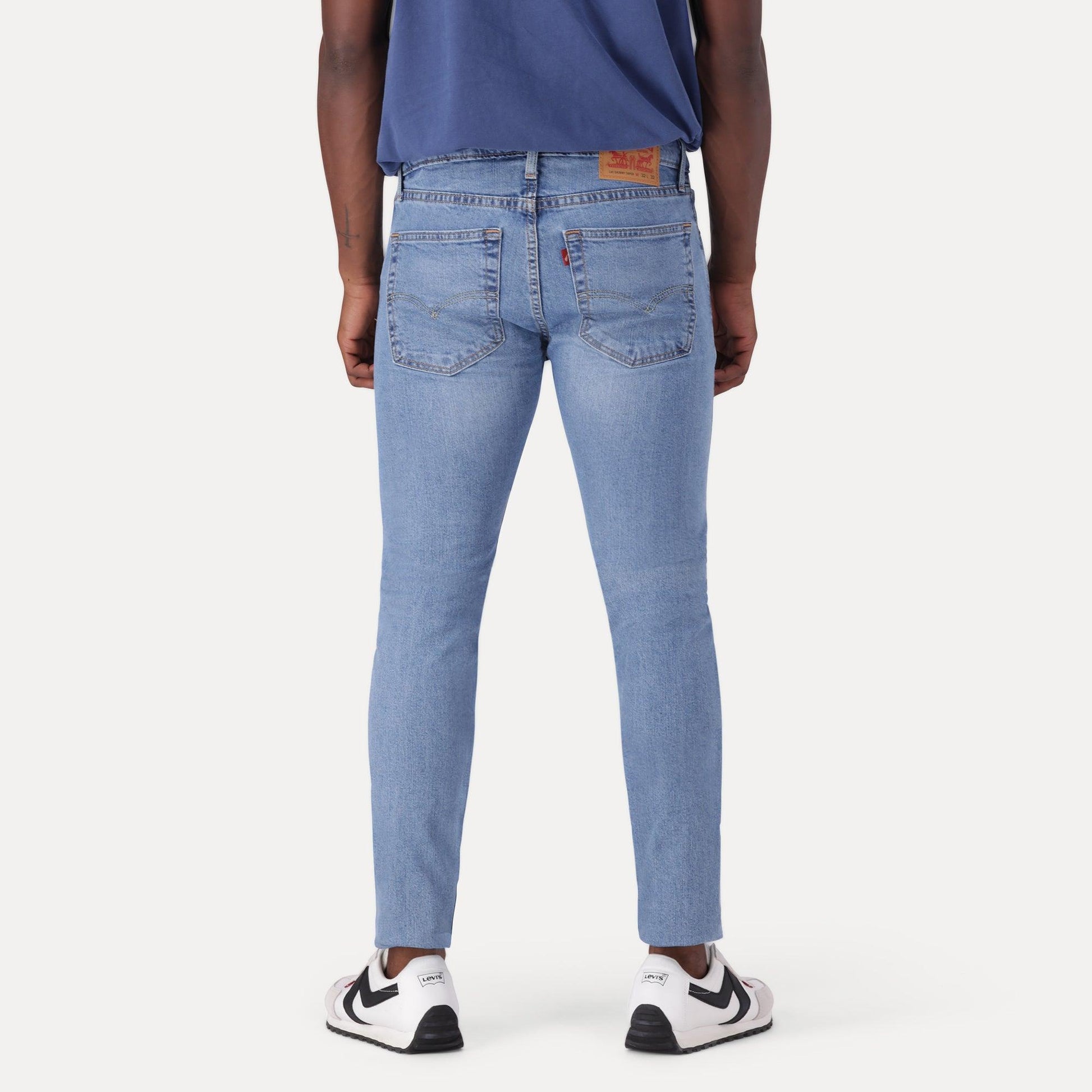 SKINNY TAPER FIT JEANS - MED INDIGO - WORN IN